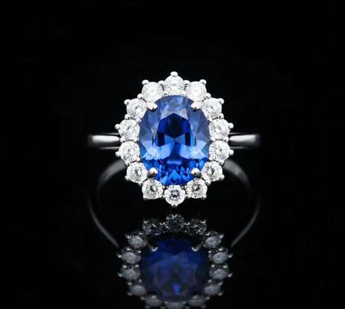 Anello pietra blu e zirconi oro 18kt