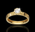Anello solitario con greca e zircone