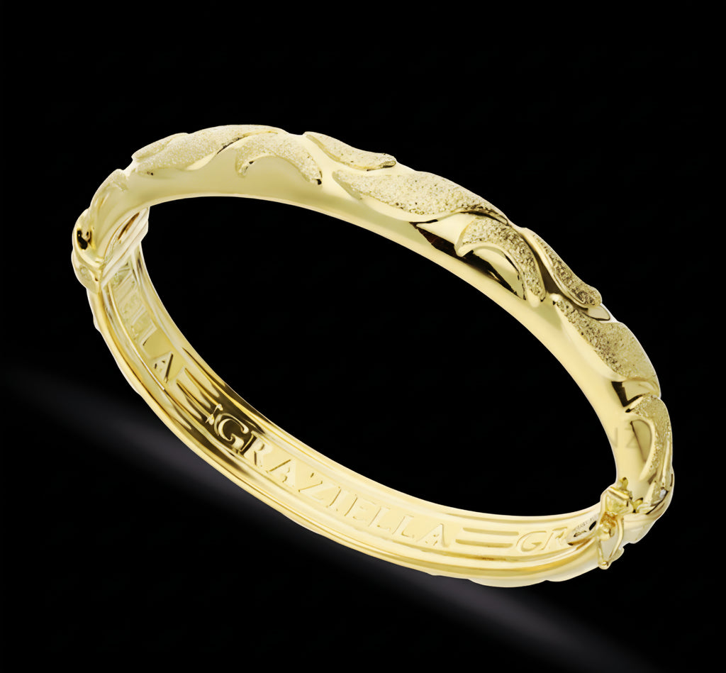 Bracciale donna rigido oro 18kt