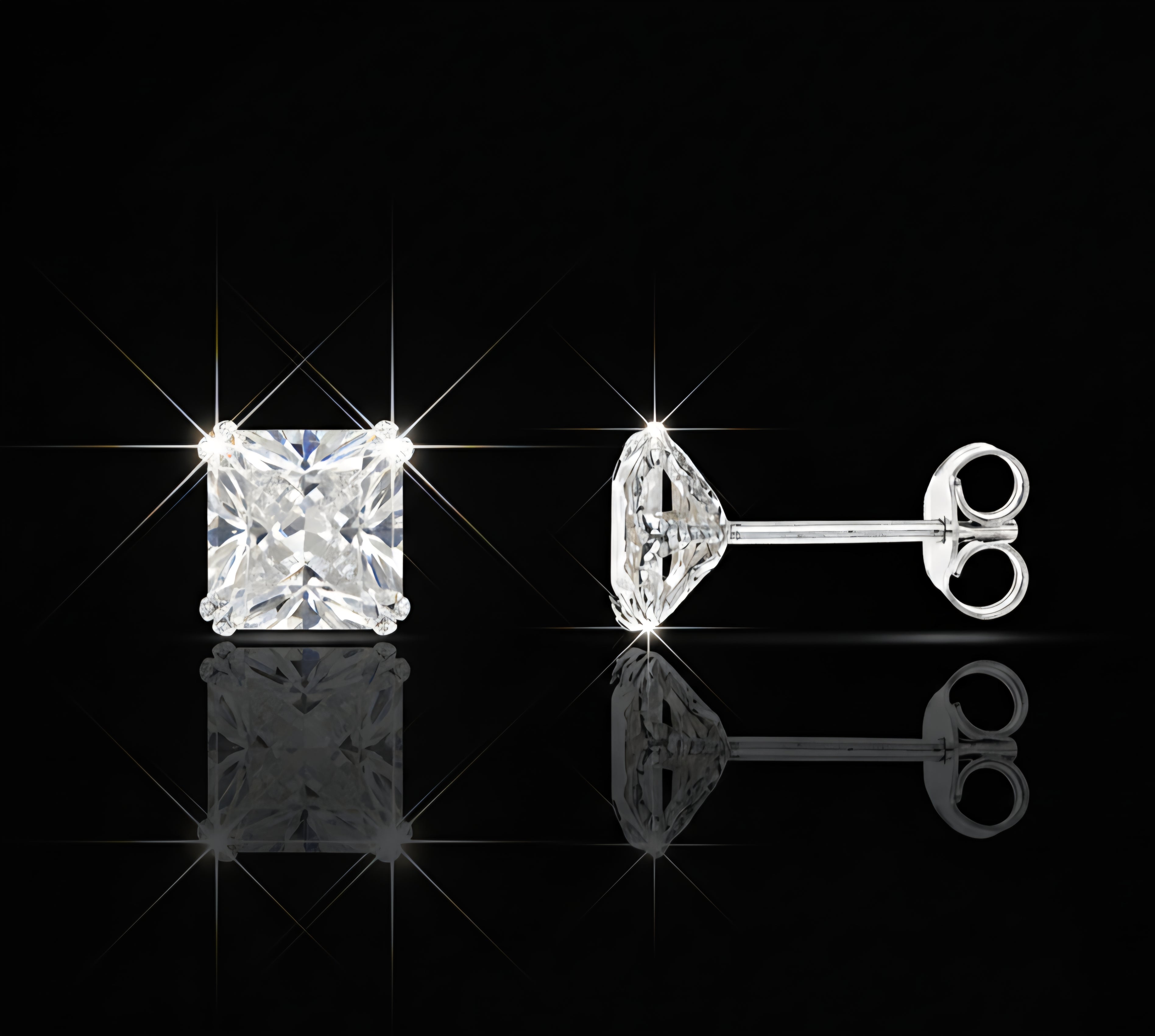 Orecchini punto luce zircone oro bianco 18kt