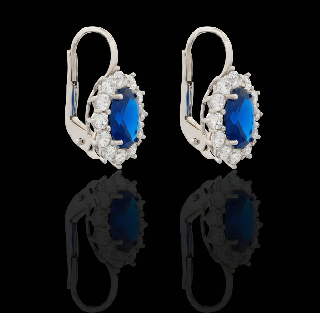 Orecchini piccoli con pietra blu e zirconi in oro bianco 18kt
